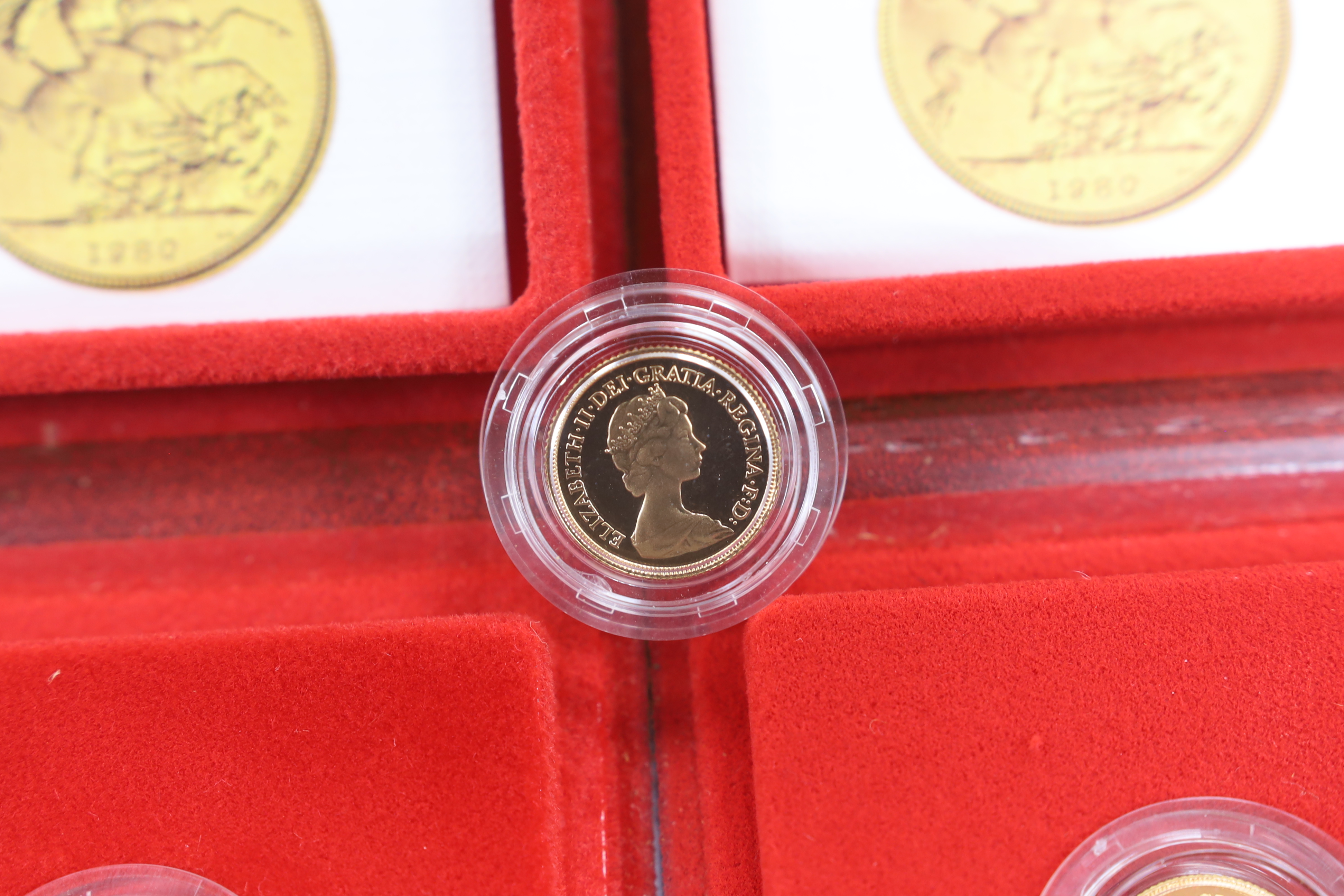 British gold coins - Two Royal Mint QEII Gold Proof Half Sovereigns, both 1980, both with case of issue and another proof gold half sovereign, 1982, without case (3)